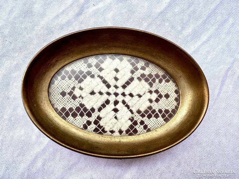 Brass ring bowl with crocheted lace tablecloth insert
