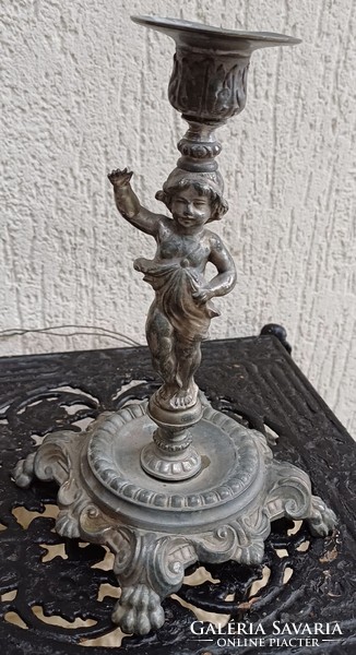 Antique candle holder figural sculpture with decorative angel face