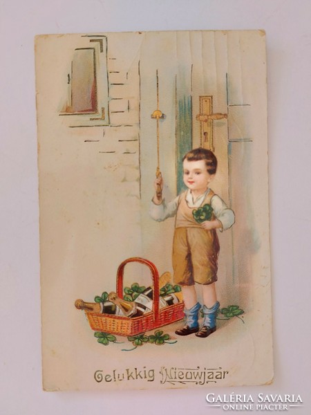 Régi képeslap újévi levelezőlap kisfiú lóhere pezsgő