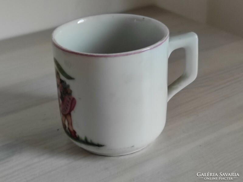 A rare hand-painted small mug from Zsolnay with a charming scene