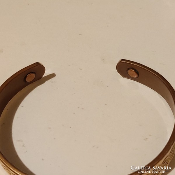 Numbered gilt copper English bracelet