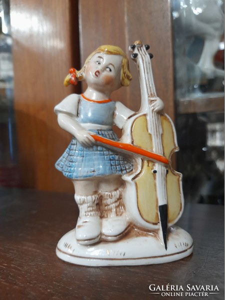 Alt German, Germany Grafenthal hand-painted porcelain figurine of a little girl with a cello. 11 cm.