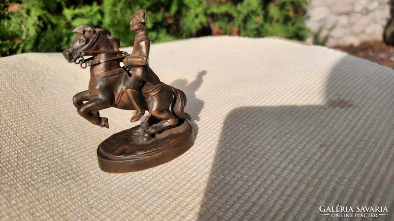 Old miniature bronze equestrian statue - commemorating the Spanish riding school in Vienna