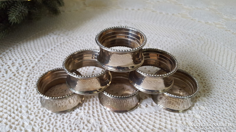6 beautiful, silver-plated napkin rings