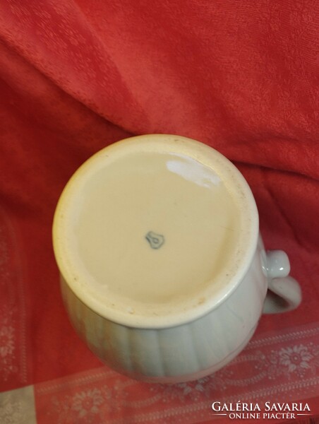 Antique porcelain spout, jug