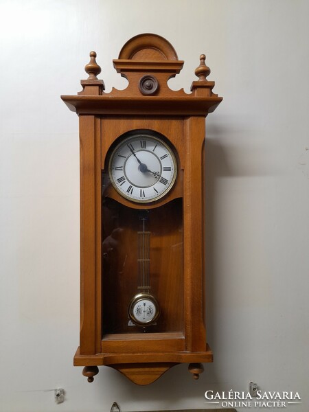 German wooden quartz wall clock, clock. 54 Cm.