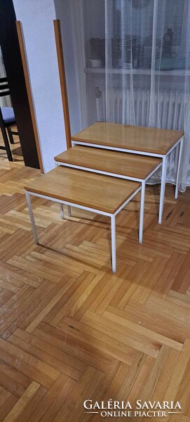 Tables that can be pushed under each other