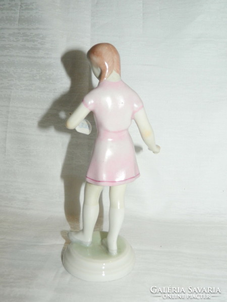 Rarely painted Köbánya porcelain girl with musical score.