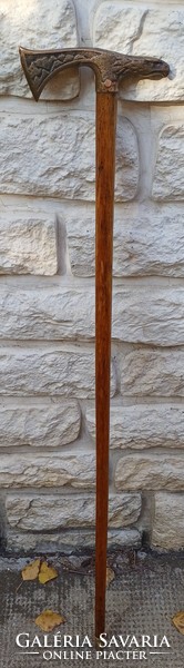 Rare eagle falcon head, antique part of the wood cleaned. Forest, Circassian hiking stick.