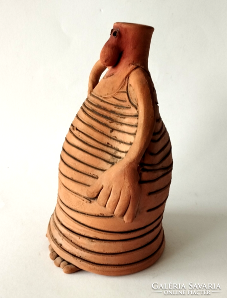 Figurative vase of fired clay by a humorous industrial artist