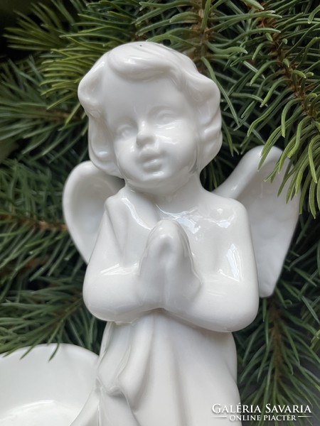 Beautifully crafted praying, snow-white porcelain angel face candle holder
