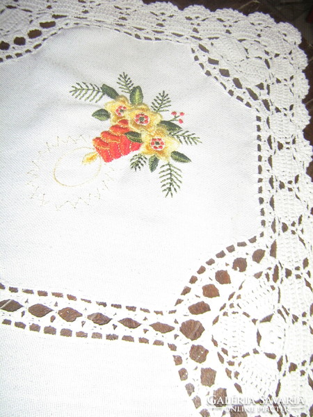 A beautiful Christmas pattern hand-crocheted tablecloth with inserts and edges
