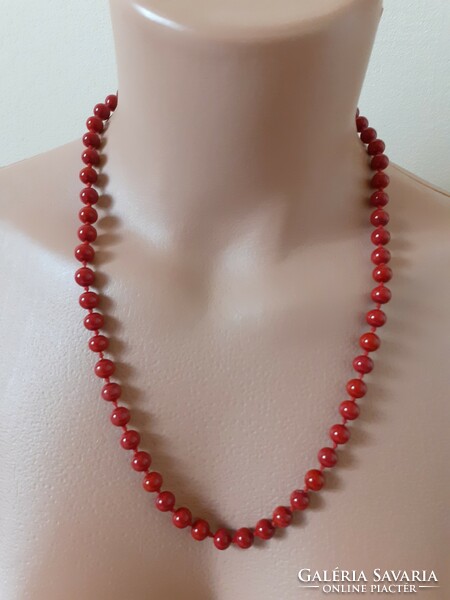 Old red individually knotted porcelain or ceramic necklace