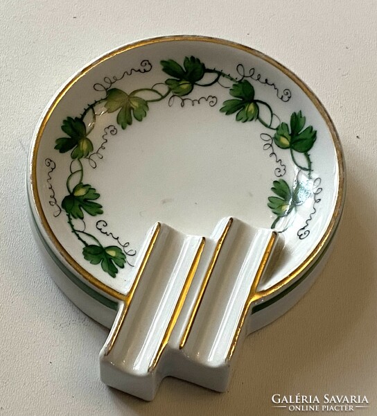A 1950s painted porcelain ashtray with an art deco feel, painted with grape leaves