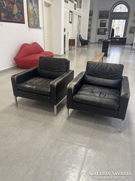 2 iconic leather armchairs (nsk)