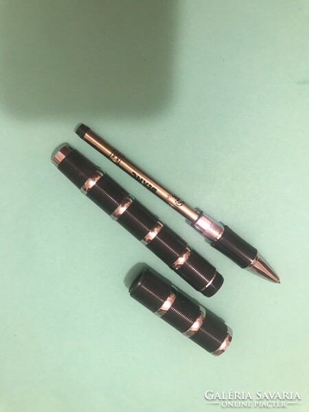 Retro ballpoint pen. 13 cm long. The cap is missing in the upper part. Black with silver decorations.