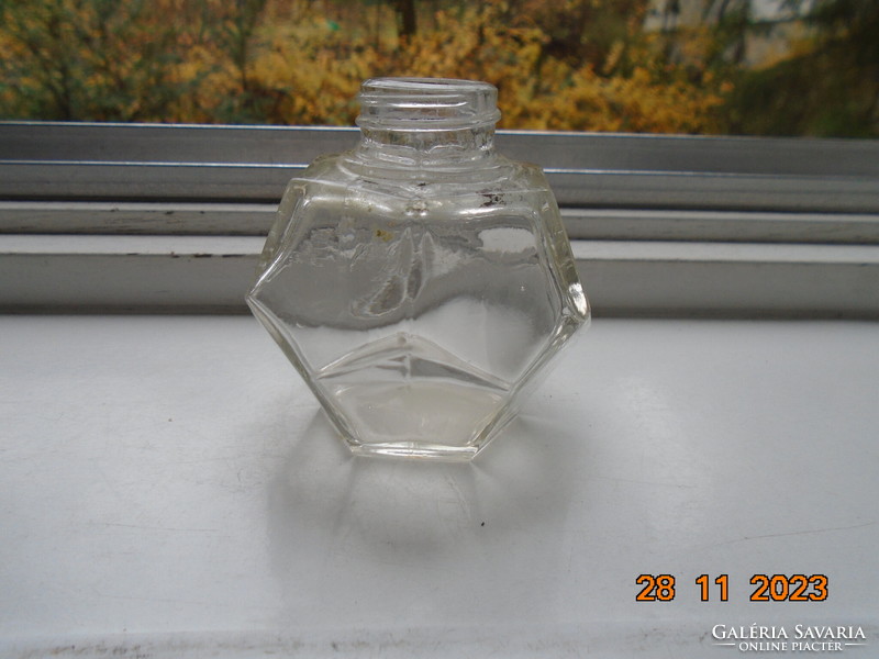 Interesting glass bottle marked with 12 pentagon-shaped sides