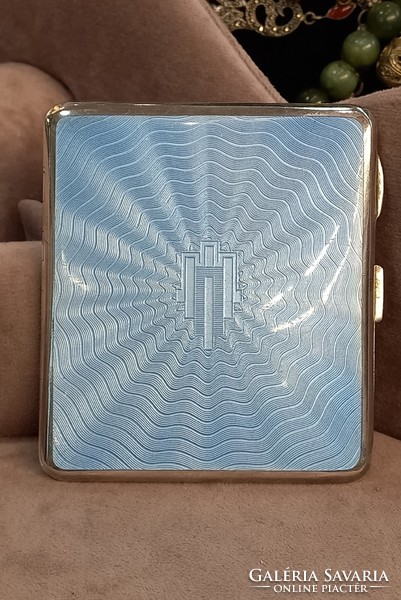 Antique silver cigarette case with fire enamel
