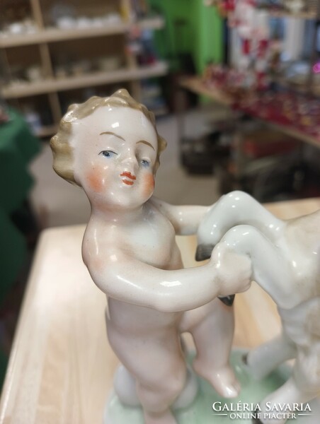 Extremely rare porcelain putto