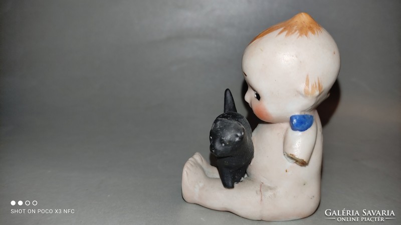 Antique kepwie doll damaged marked with a black cat