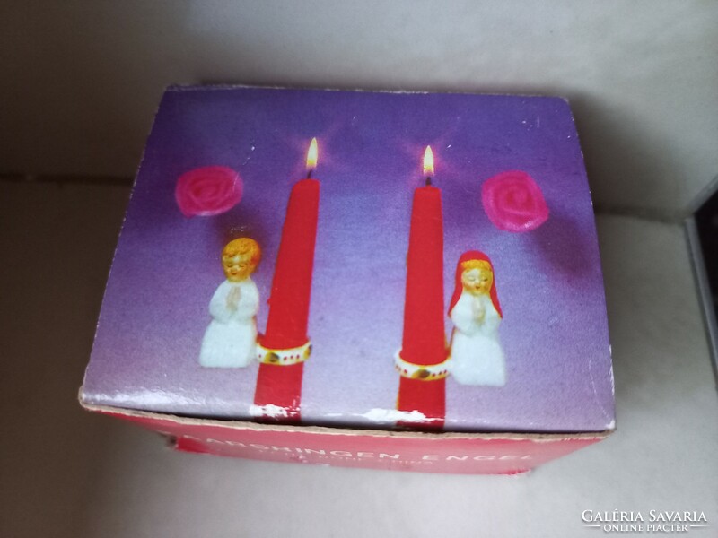 Pair of porcelain candle rings, praying figures