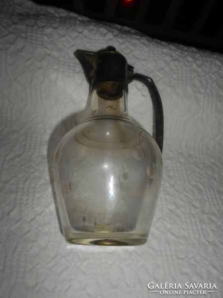 Antique polished glass decanter with metal fitting