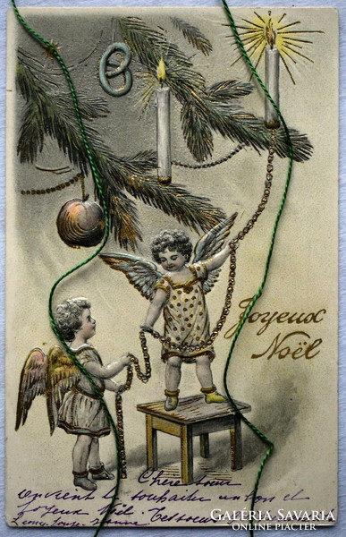 Antique embossed Christmas postcard - angels decorate a Christmas tree - for collection