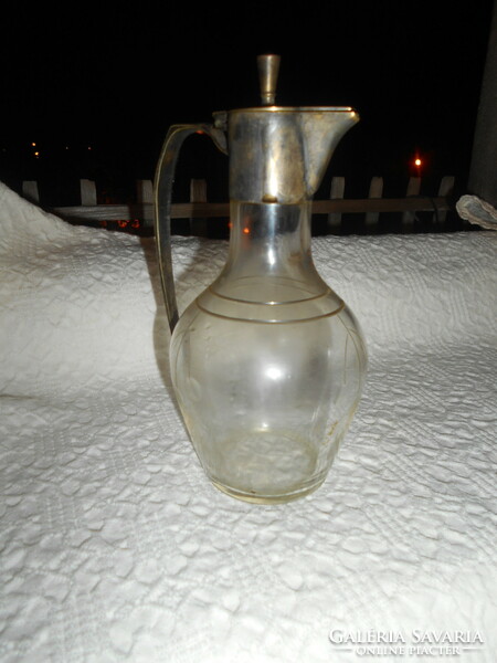 Antique polished glass decanter with metal fitting