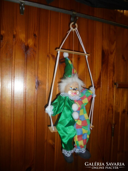 Retro rocking, hanging clown doll figure