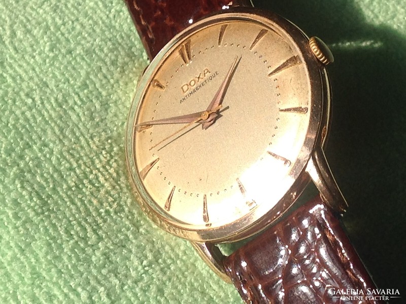 Doxa 14k gold watch with factory gold case and rare strap lugs from the 1950s