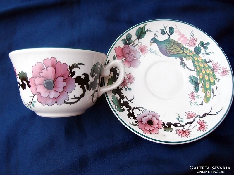 Old earthenware tea cup + saucer