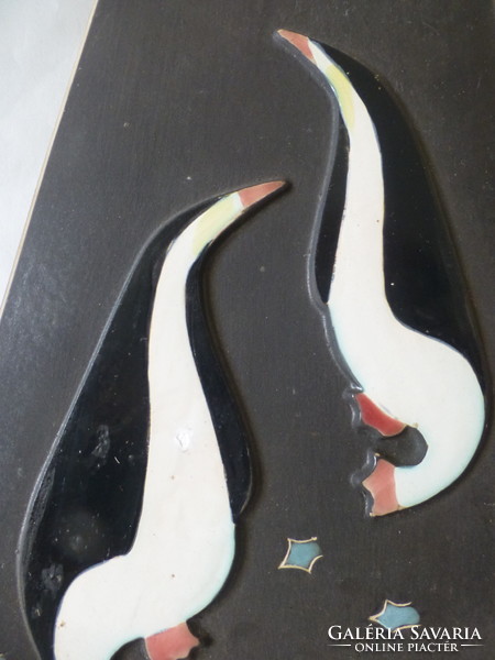 Art deco wall decoration with birds and penguins