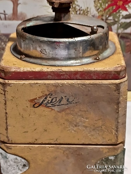 Very old coffee grinder with aero inscription