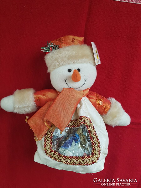 Christmas snowman figurine in sugar bowl