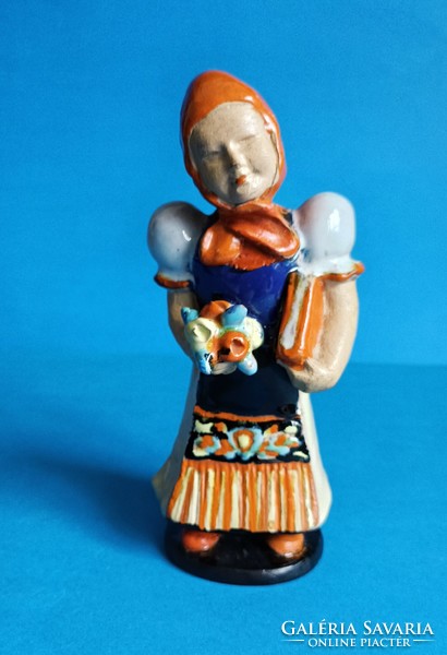 Matyó Szécsi ceramic figurine of a girl with a flower