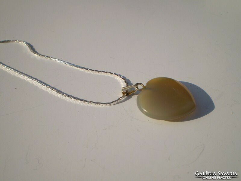For half, a real moonstone heart pendant with a chain for cheap