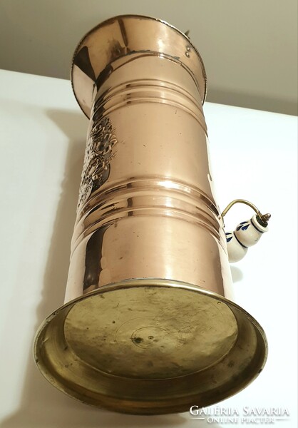 Copper umbrella stand, with embossed water branch motif and porcelain tongs
