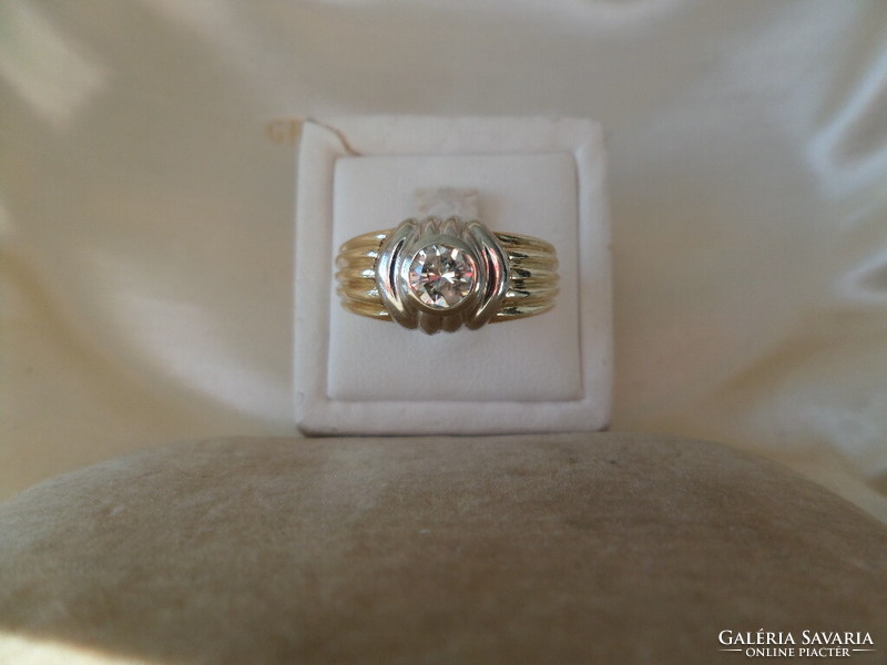 Yellow - white gold ring with 0.35 Ct brill