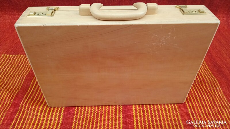 Vintage amiet wood briefcase with 3-digit code and pockets. Negotiable!