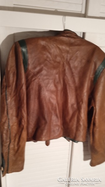 I would call this old women's leather jacket hunter or folk costume