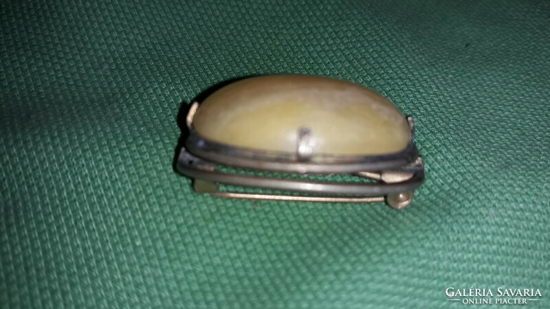 Antique very nice hat pin brooch with a jade-like stone in a silver-plated socket, as shown in the pictures