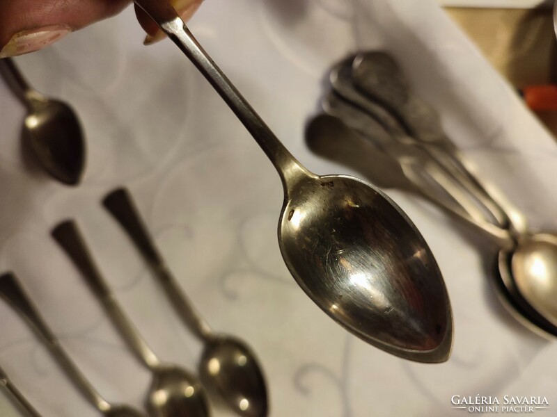 12 silver mocha spoons with dog heads