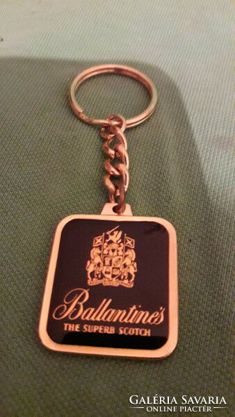 Old ballantines scotch whiskey advertising metal key ring as shown in the pictures