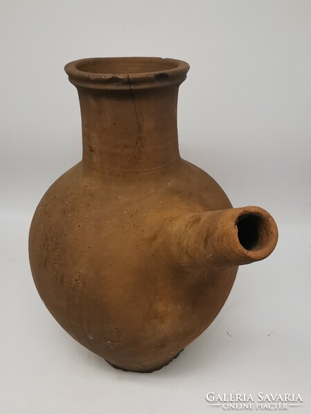 Traditional earthenware pitcher, sprinkler