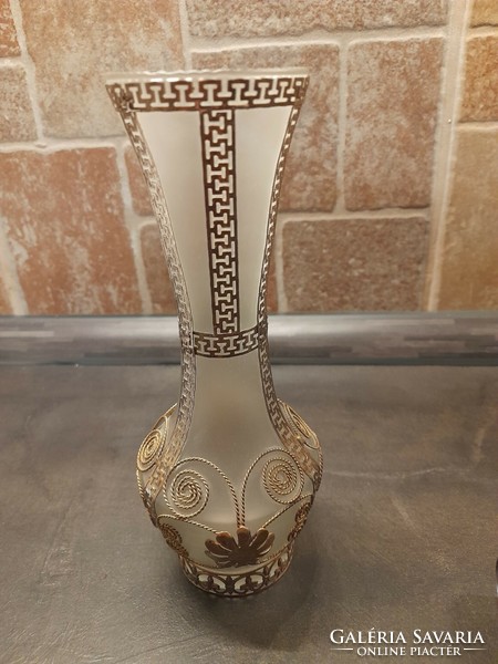 Milk glass vase decorated with metal flowers and Greek pattern