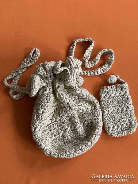 Crocheted bag with phone holder.