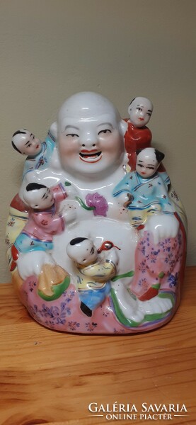 Laughing Buddha porcelain statue - lucky charm