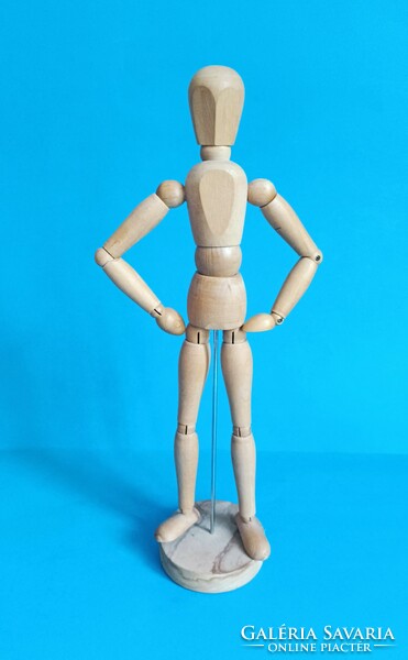 Adjustable wooden doll figure