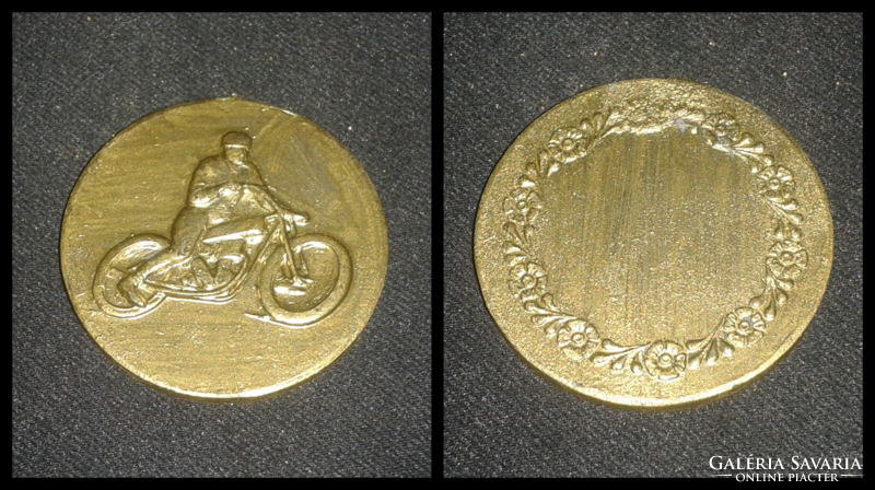 Old motorcycle coin