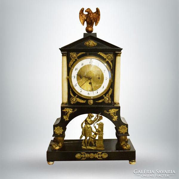 Empire quarter calendar mantel clock with alabaster columns and gilded decoration